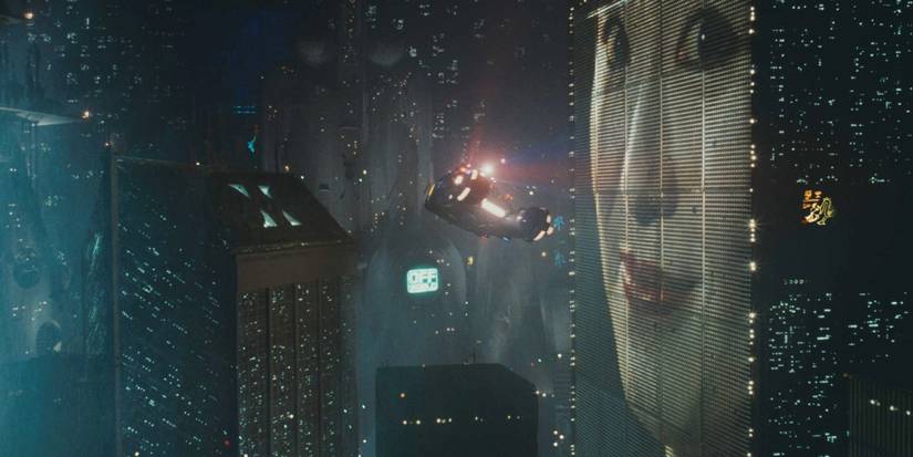 The iconic image of a holographic advertisement projected on a building in Blade Runner