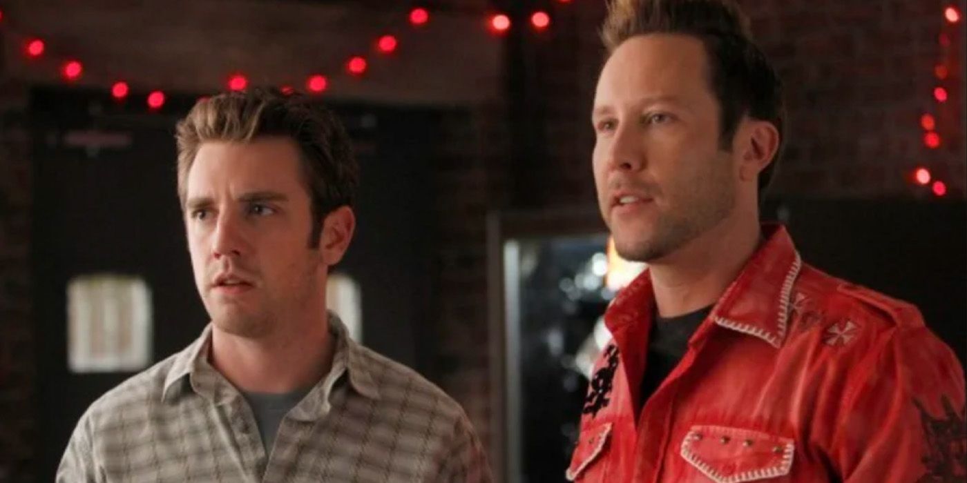Cameron Price (Bret Harrison) stands beside Dutch Nilbog (Michael Rosenbaum) on &lsquo;Breaking In.'