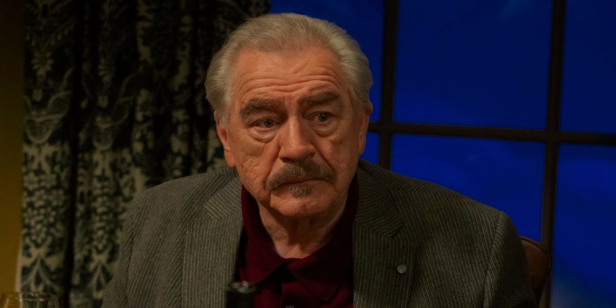 Frank, played by actor Brian Cox, sat in front of a dark window in The Parenting.