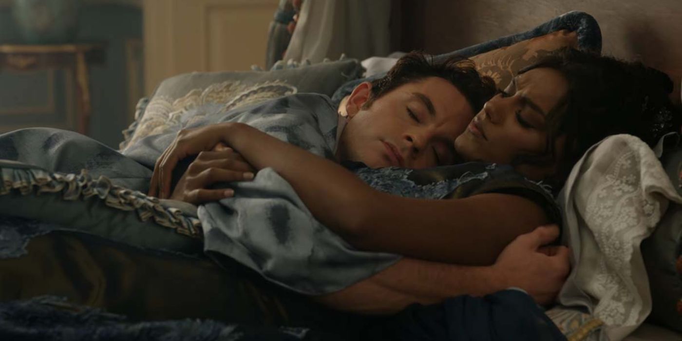 Anthony Bridgerton (Jonathan Bailey) cuddling with his wife, Kate (Simone Ashley), in bed in &lsquo;Bridgerton&rsquo;