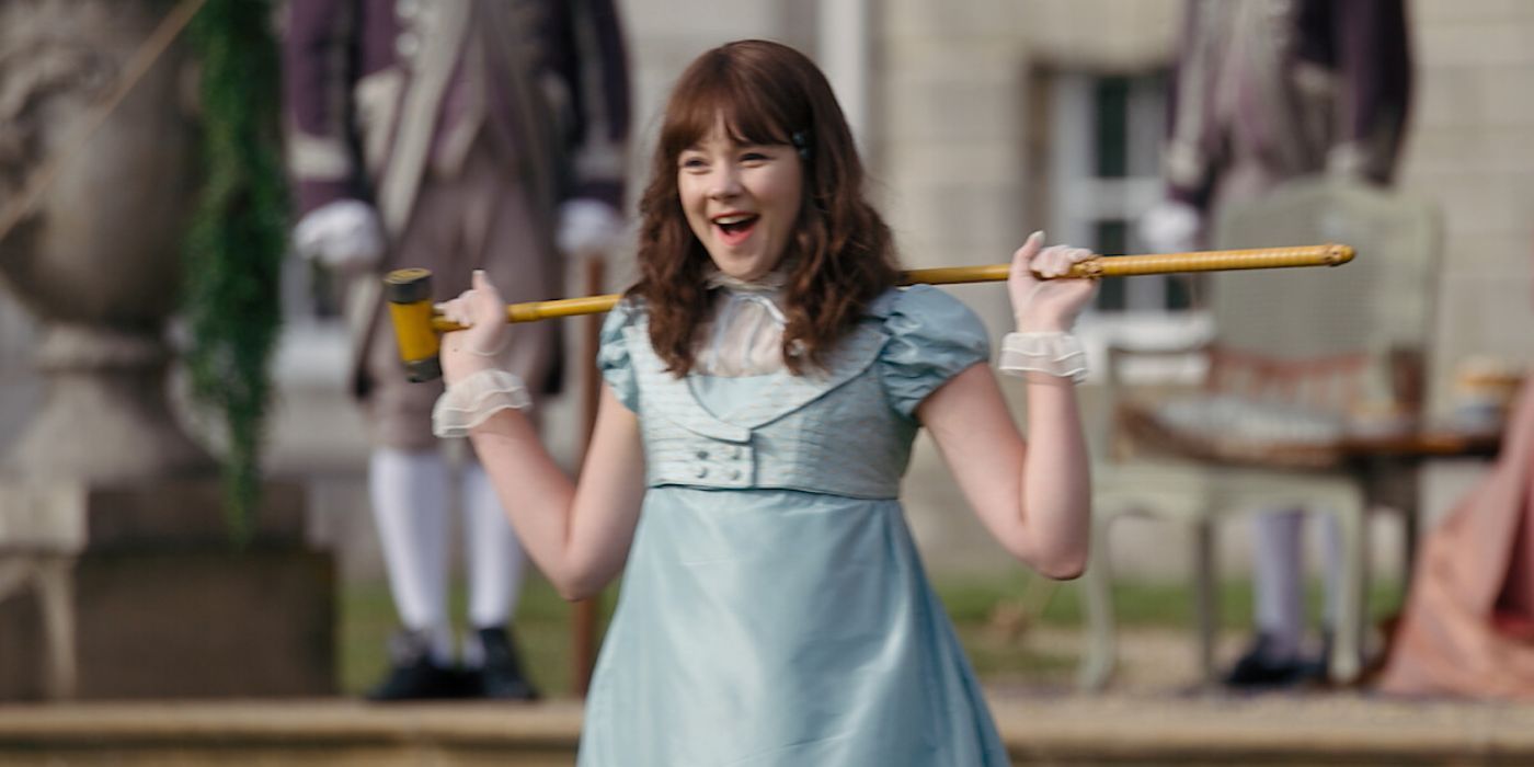 Eloise (Claudia Jessie) looks amused while playing Pall Mall in &lsquo;Bridgerton&rsquo;