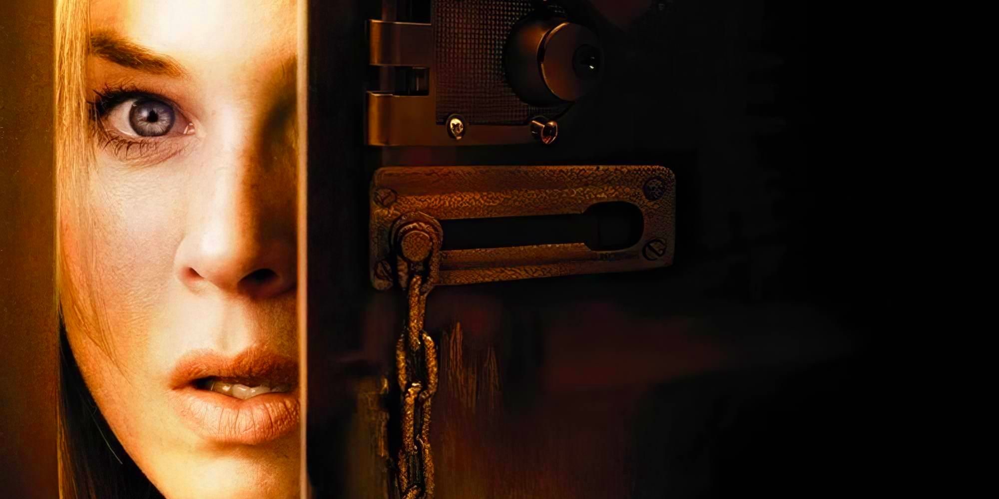 Emily, played by actor Renee Zellweger, peers frightened around an apartment door in Case 39.