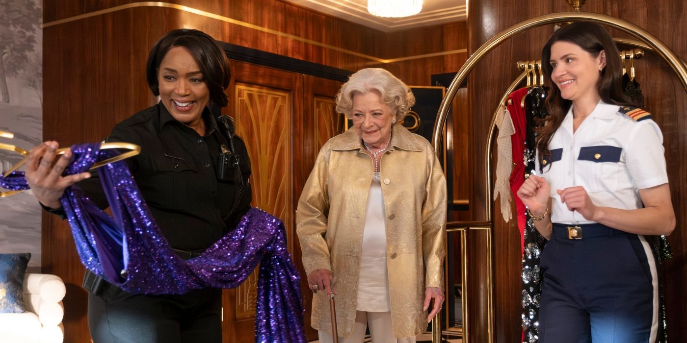 Angela Bassett looks at a dress while Phillipa Soo and Debra Mooney watch in Doctor Odyssey Episode 11
