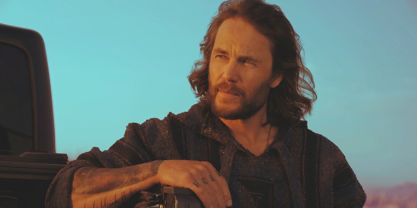Taylor Kitsch is squinting his eyes as he looks sideways in The Terminal List: Dark Wolf