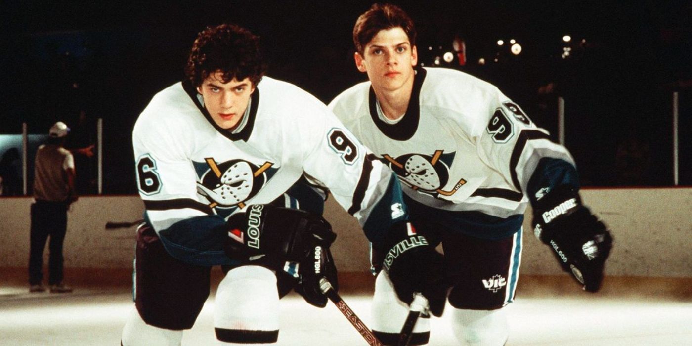 Members of the Mighty Ducks skate on a hockey rink
