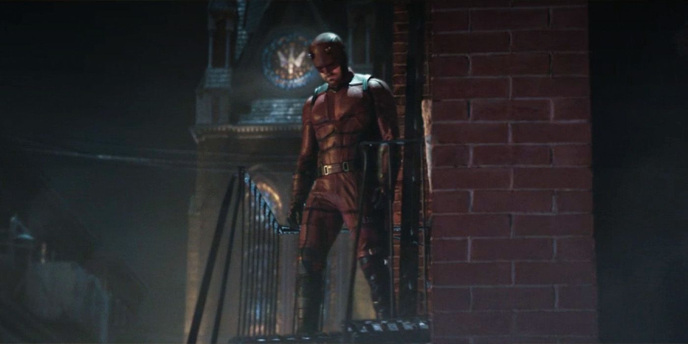 Daredevil (Charlie Cox) stands on a fire escape with a Catholic cathedral in the background on &lsquo;Daredevil: Born Again&rsquo;.