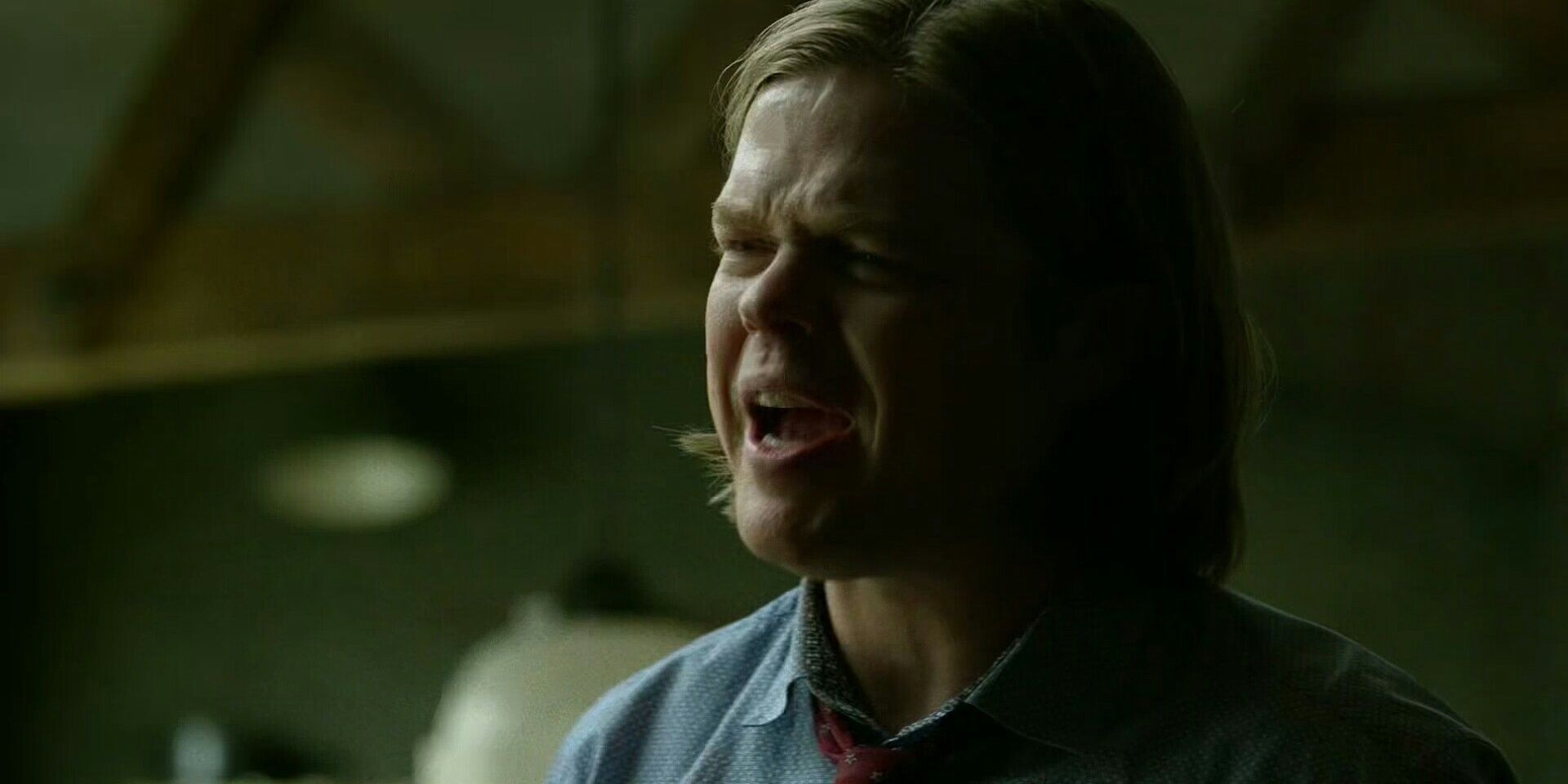 A man yelling at someone off screen