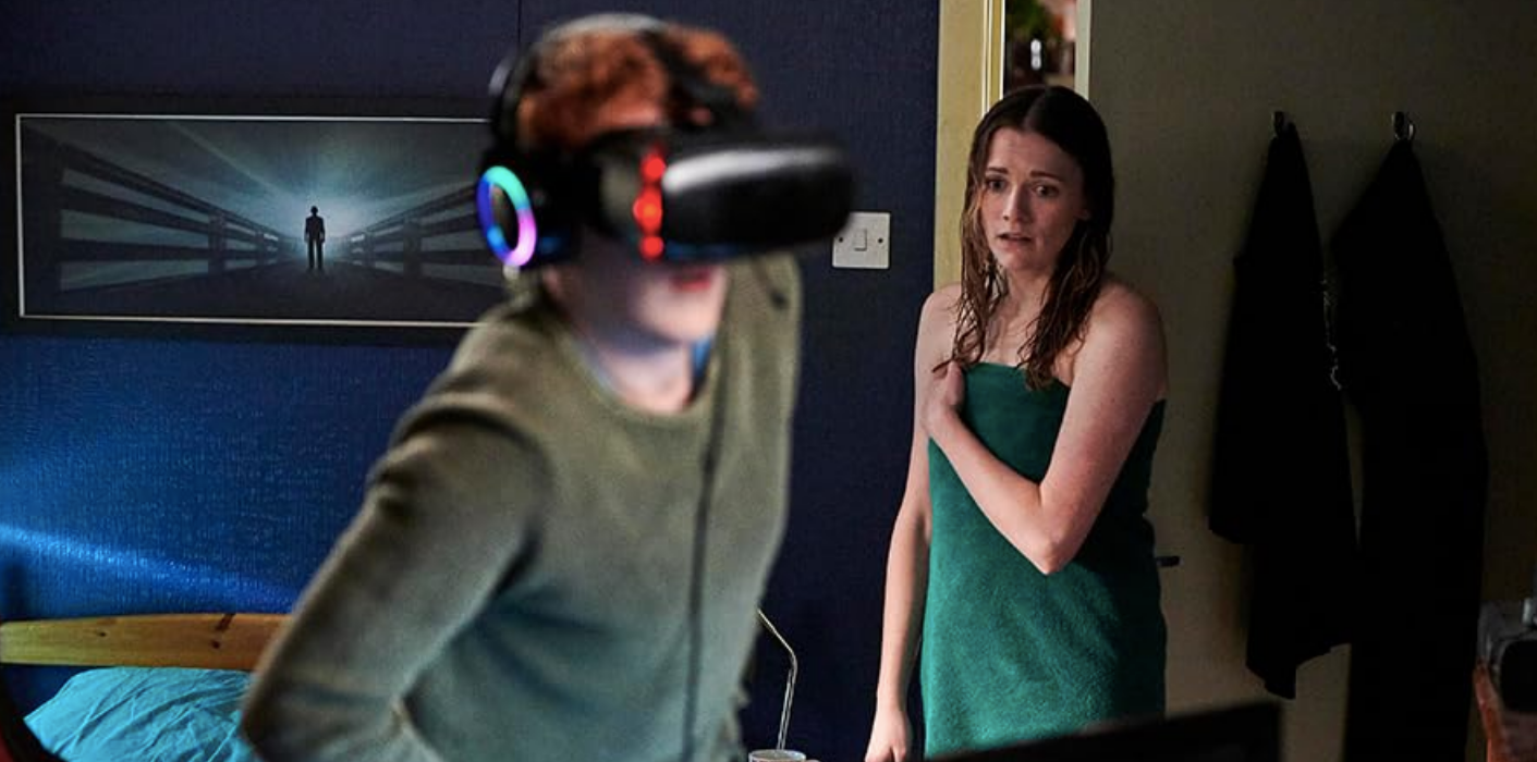 Will Merrick as Nicky, playing a VR game in Dead Pixels