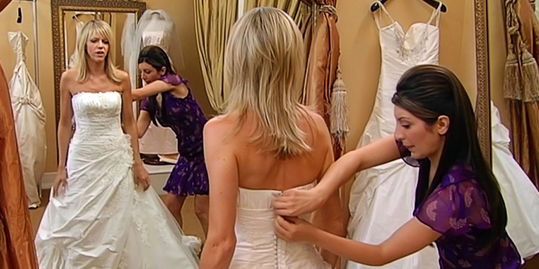 Kaitlin Olson tries on a wedding dress as Nasim Pedrad assists in It&rsquo;s Always Sunny in Philadelphia Season 5