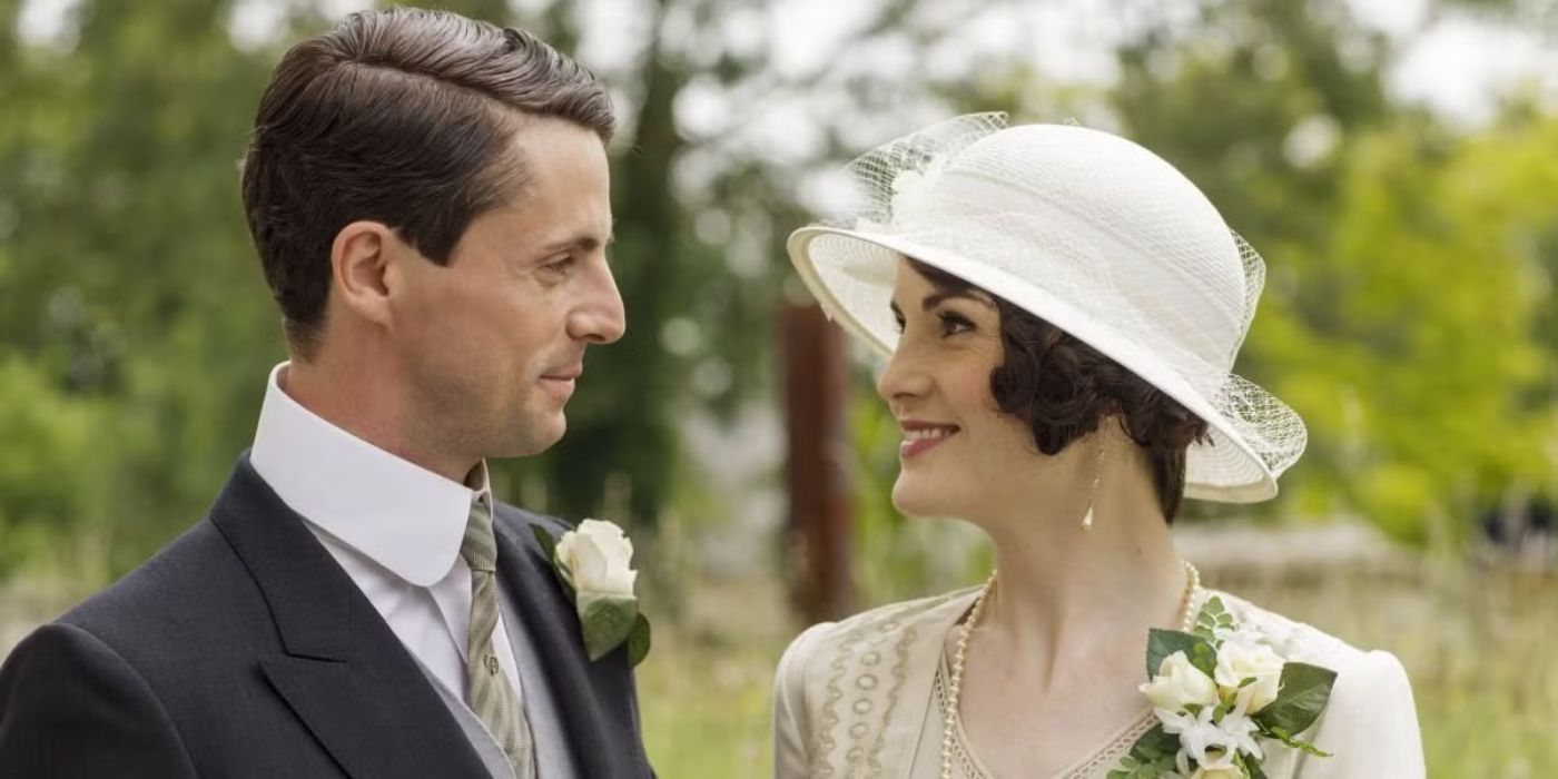 Matthew Goode as Henry Talbot smiles at Michelle Dockery as Mary at their wedding in Downton Abbey.