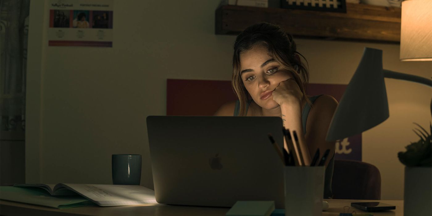 Lucy Hale as Eva staring at her computer screen in F Marry Kill.