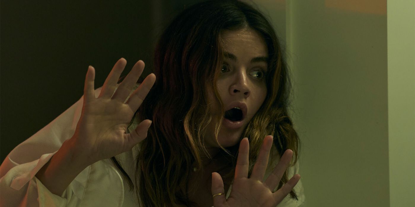 Lucy Hale as Eva holding her hands up in F Marry Kill.