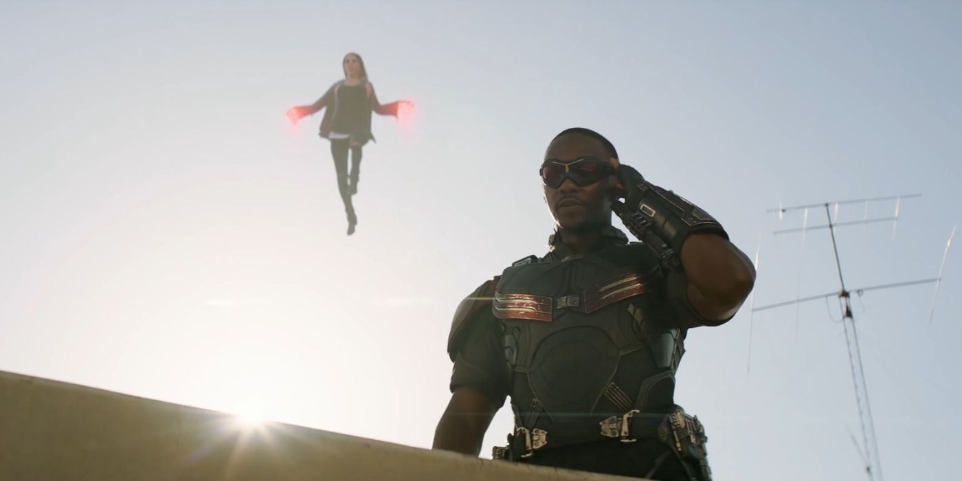 Falcon talking on comms with Wanda floating behind him in Captain America: Civil War.