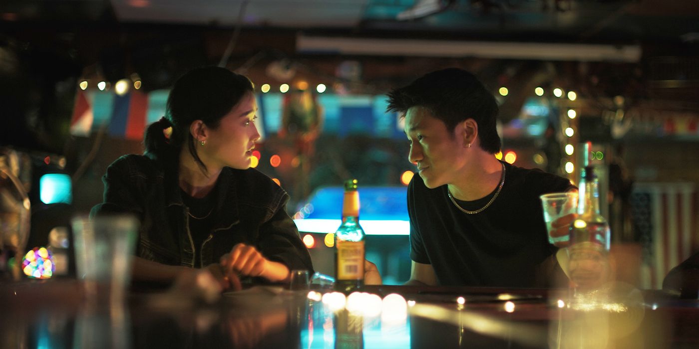 Andie Ju looking at Brandon Soo Hoo at a bar in Forge