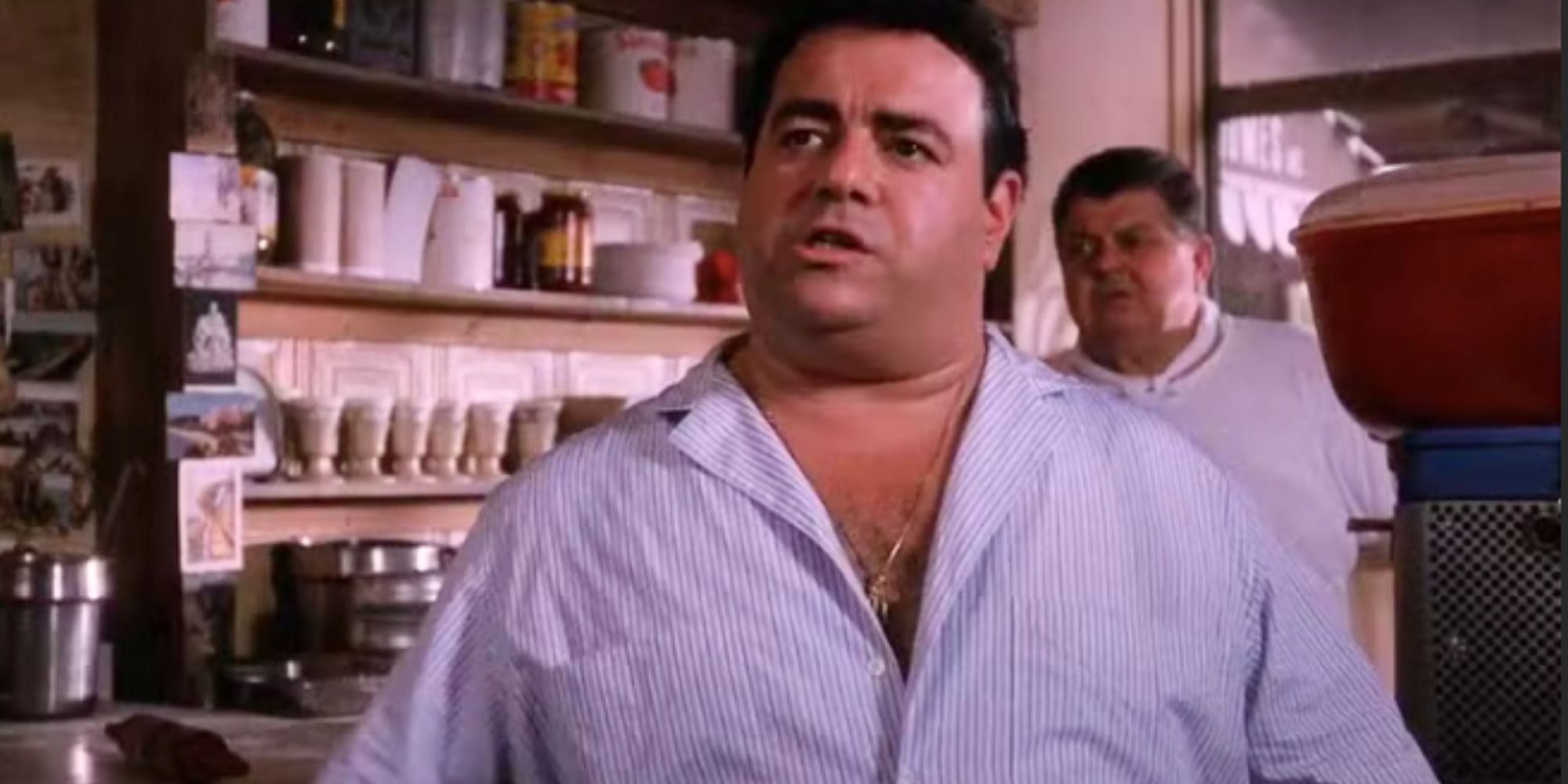 Frank DiLeo as Tuddy Cierco standing in a kitchen in Goodfellas, 1990.