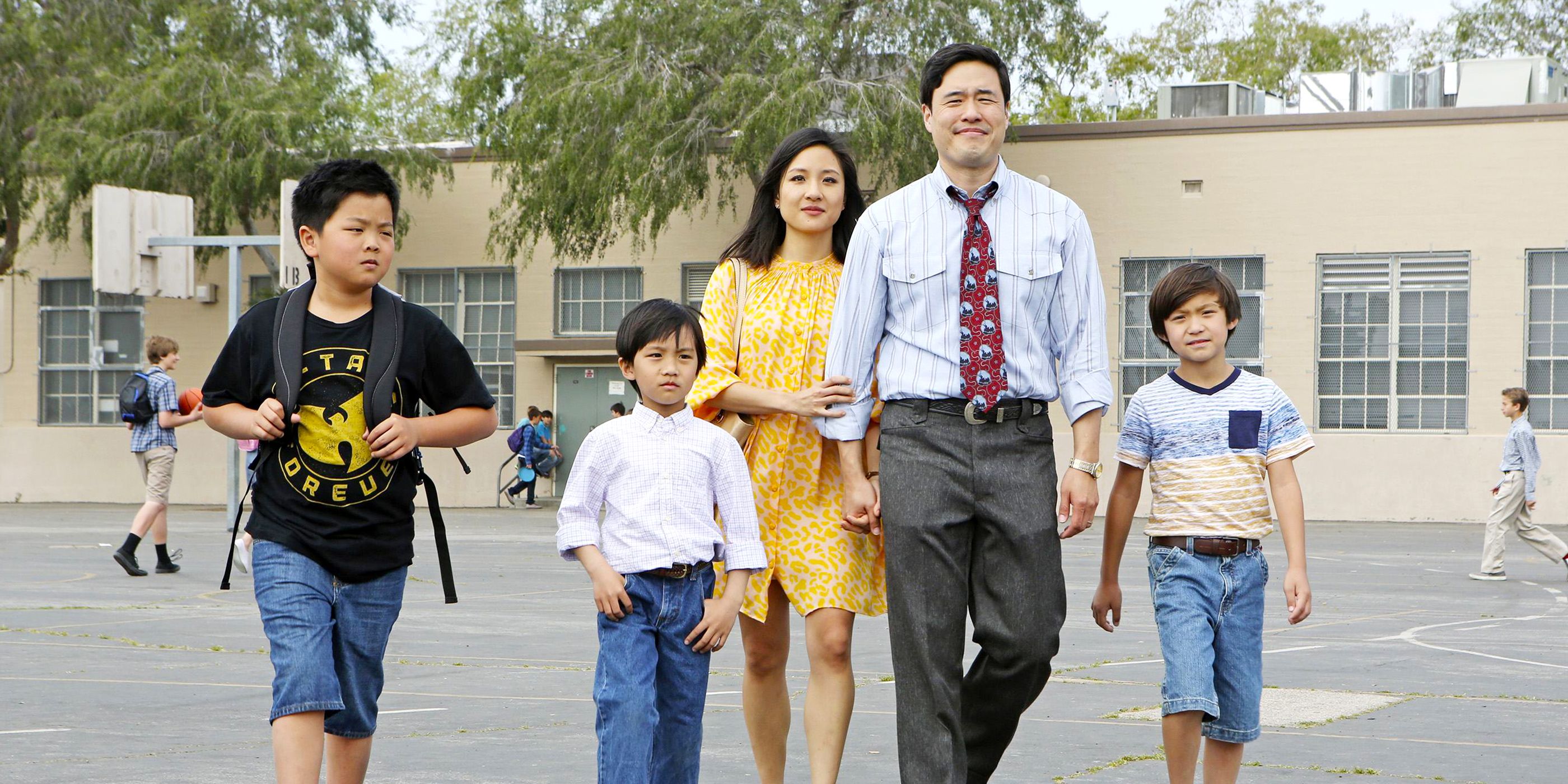 Randall Park and Constance Wu with the younger cast of Fresh Off the Boat