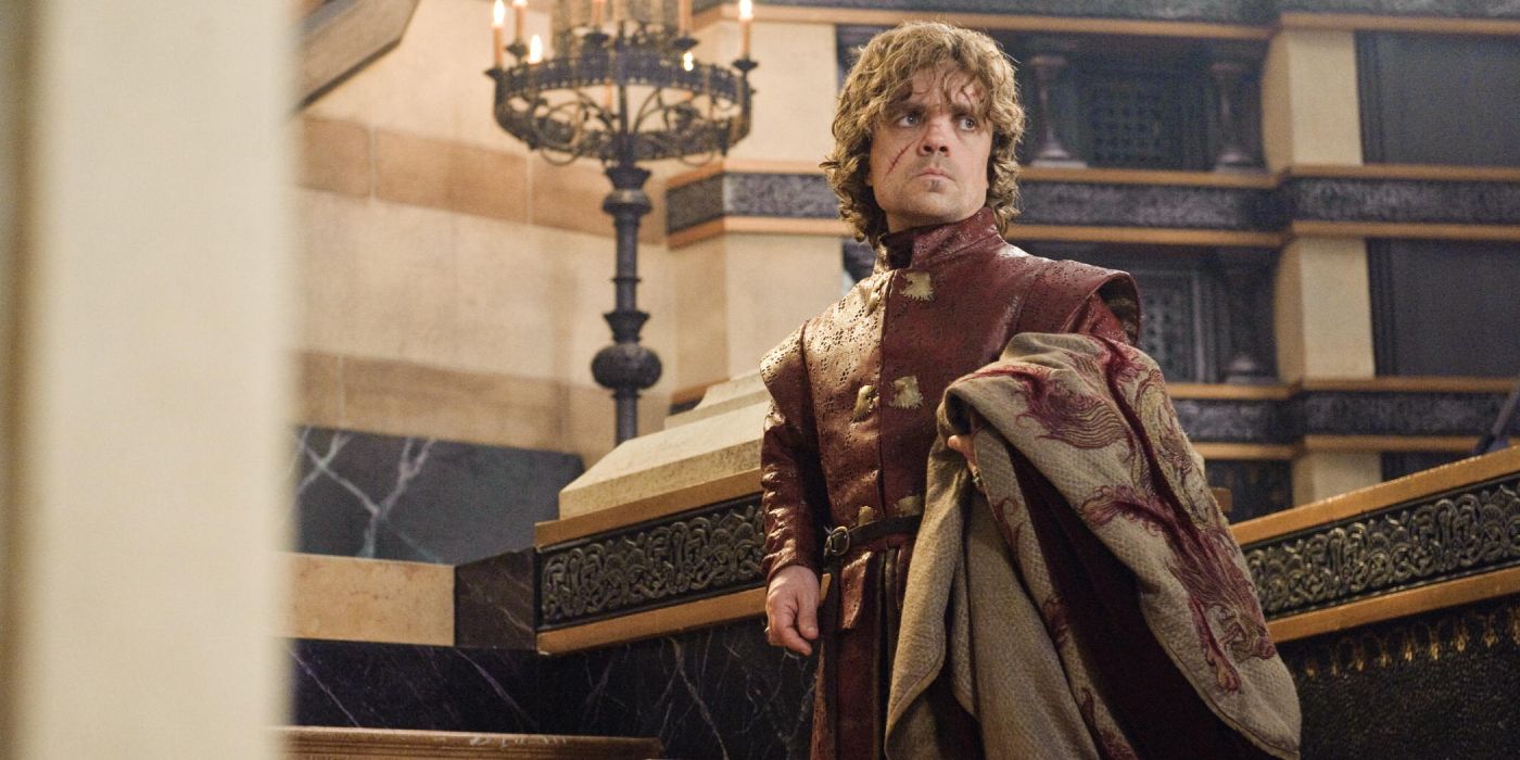 Tyrion Lannister holding Sansa&rsquo;s wedding cloak and looking ahead in Game of Thrones