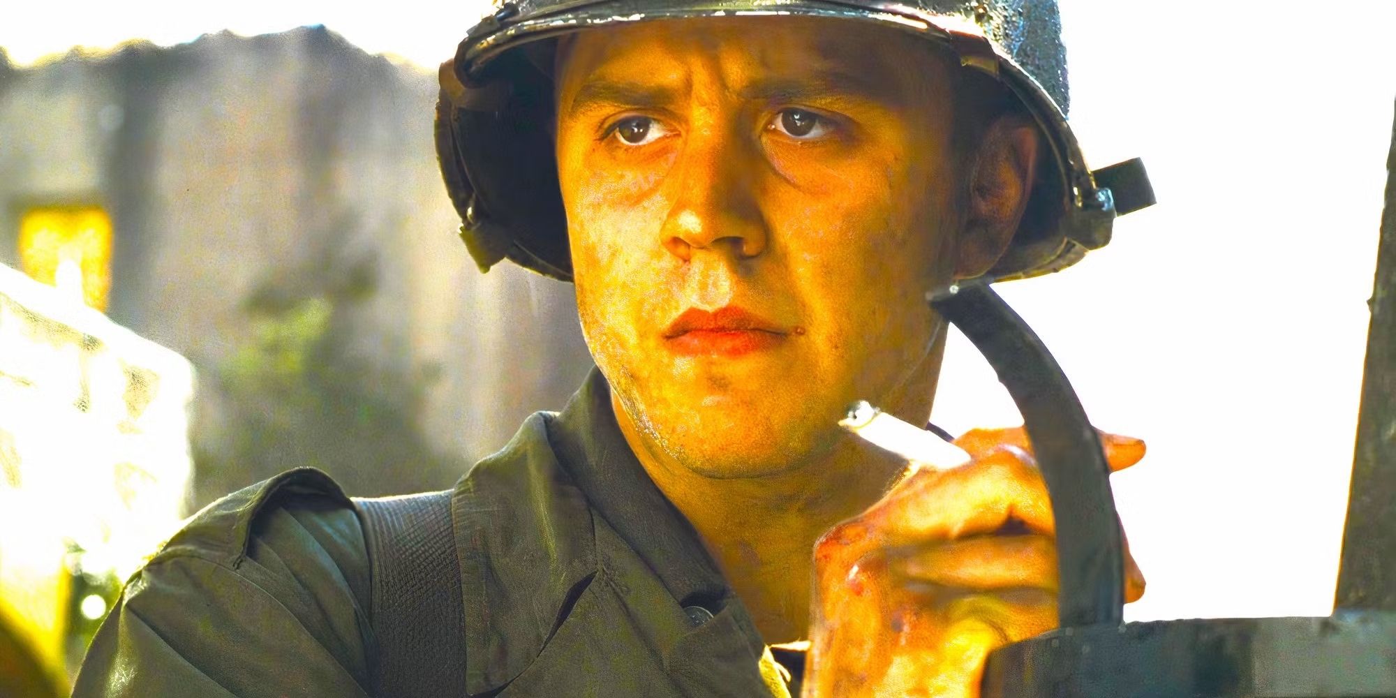 Giovanni Ribisi as a solider wears a helmet and holds a cigarette, looking serious in Saving Private Ryan.
