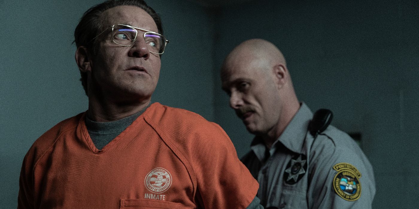 Keith Jesperson (Dennis Quaid) being restrained by a prison guard in Happy Face