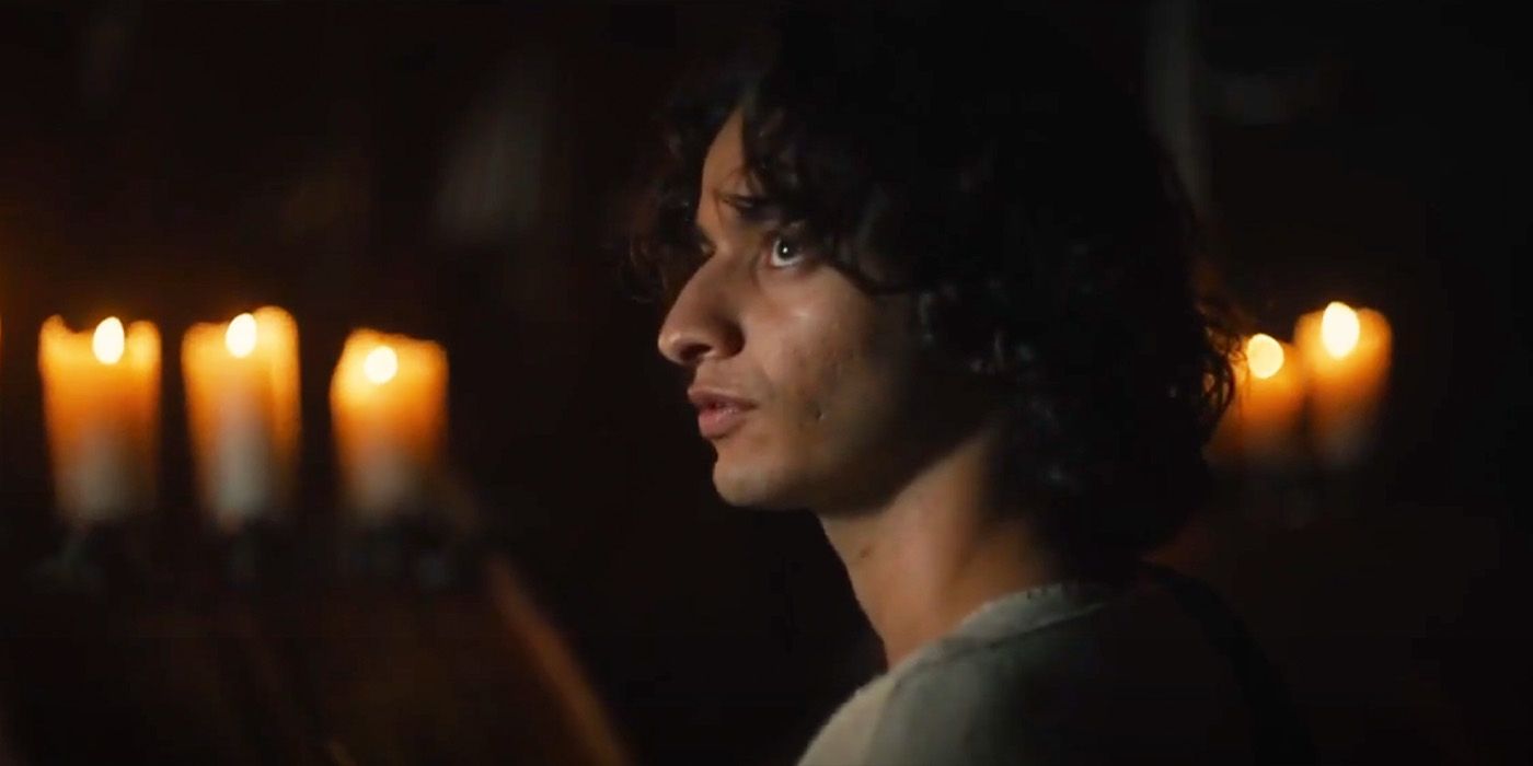 Michael Iskander as David looks up, surrounded by candles, on 'House of David'