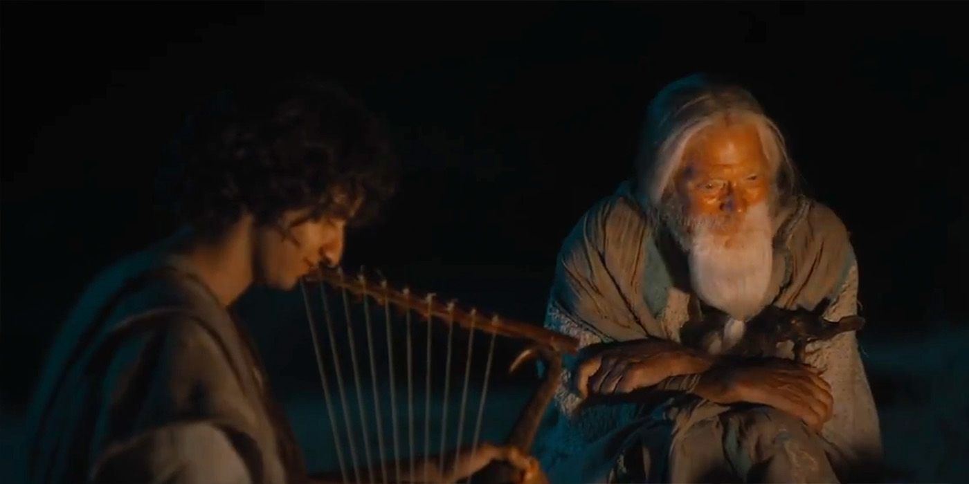 David and Samuel sitting by a fire in House of David Episode 7