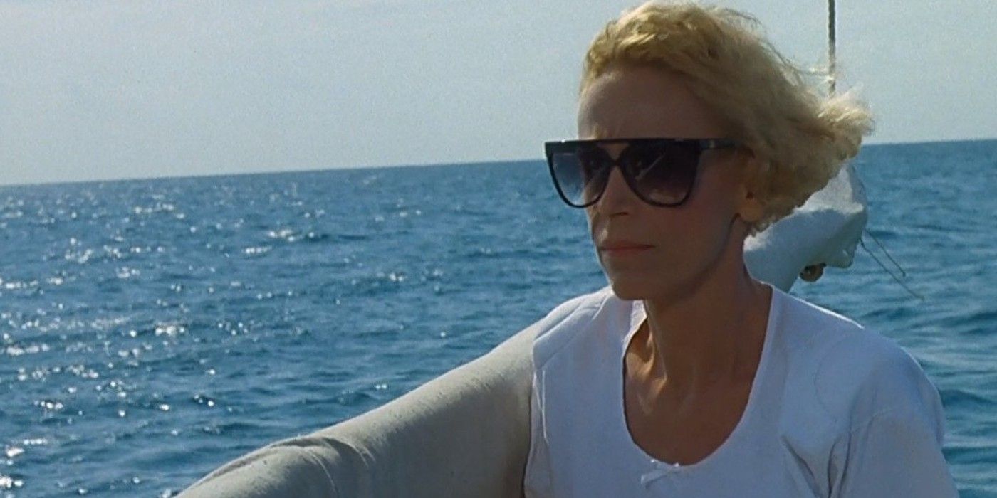 Ellen Brody (Lorraine Gray) looking determined while wearing sunglasses on a boat in &lsquo;Jaws: The Revenge&rsquo;
