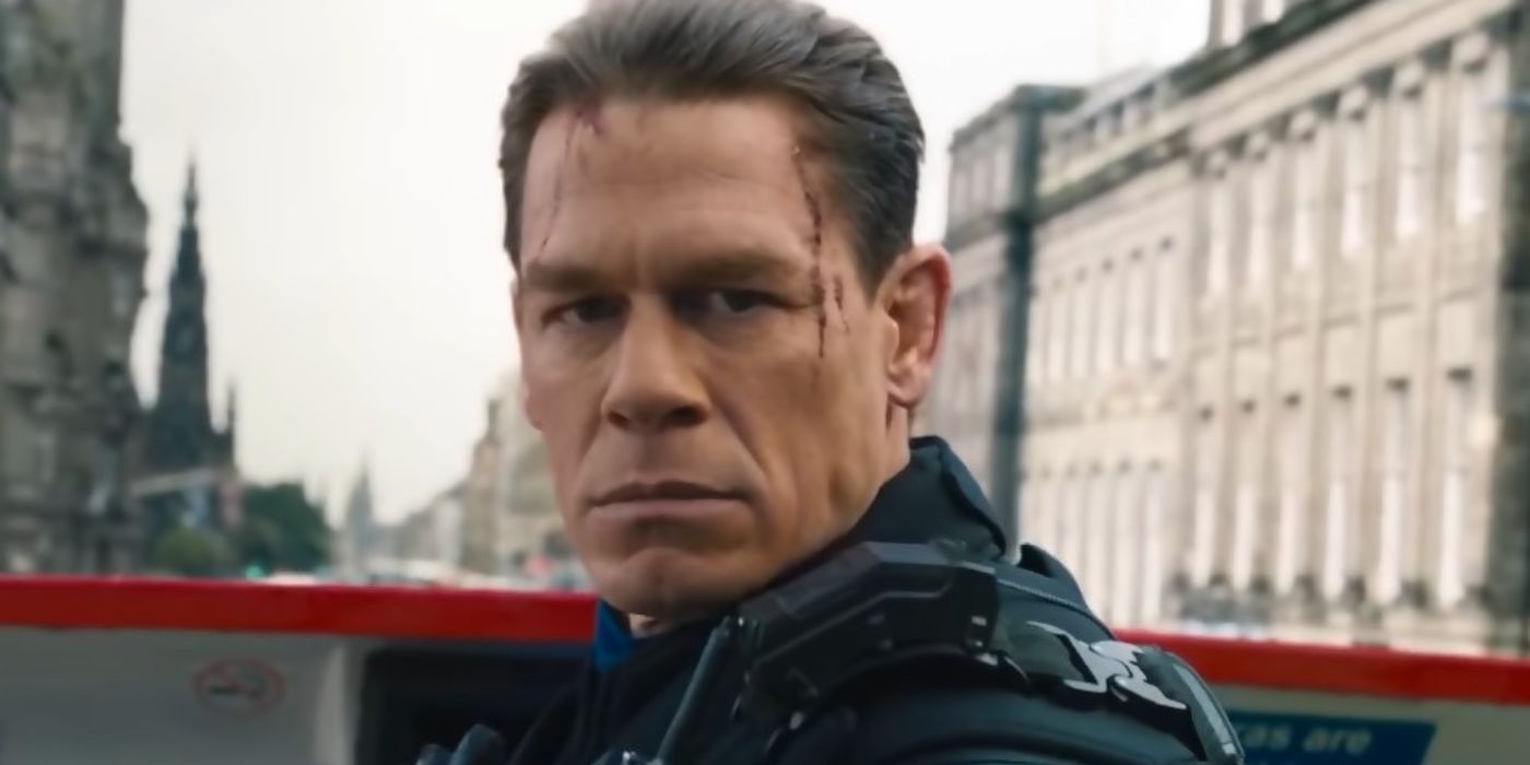 John Cena as Jakob Toretto with blood trickling down his forehead, looking just past the camera in F9.