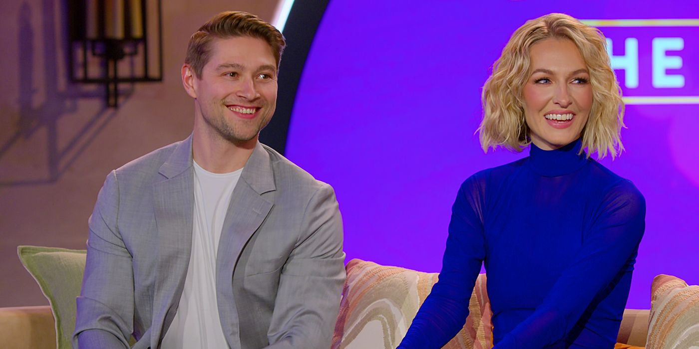 Mason and Meg sitting next to one another and smiling at the Love Is Blind 8 reunion.