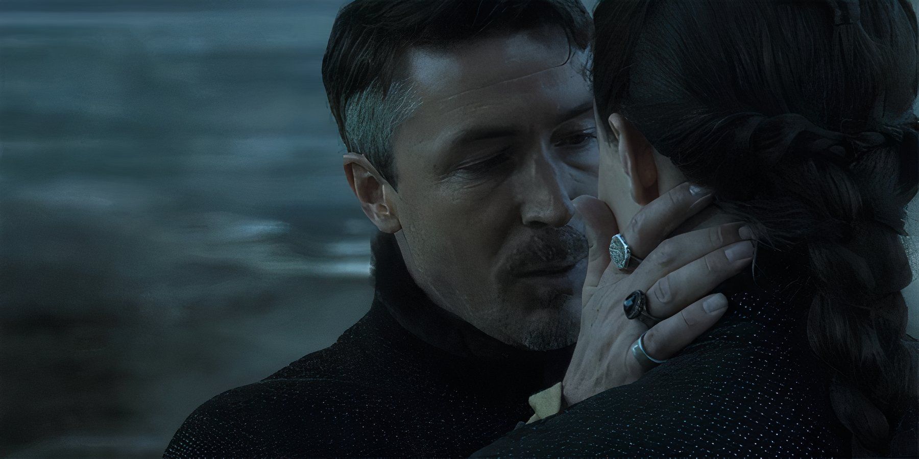 Littlefinger holding Sansa Stark&rsquo;s face tenderly, while trying to convince her to marry in Season 5, Episode 3 of Game of Thrones.