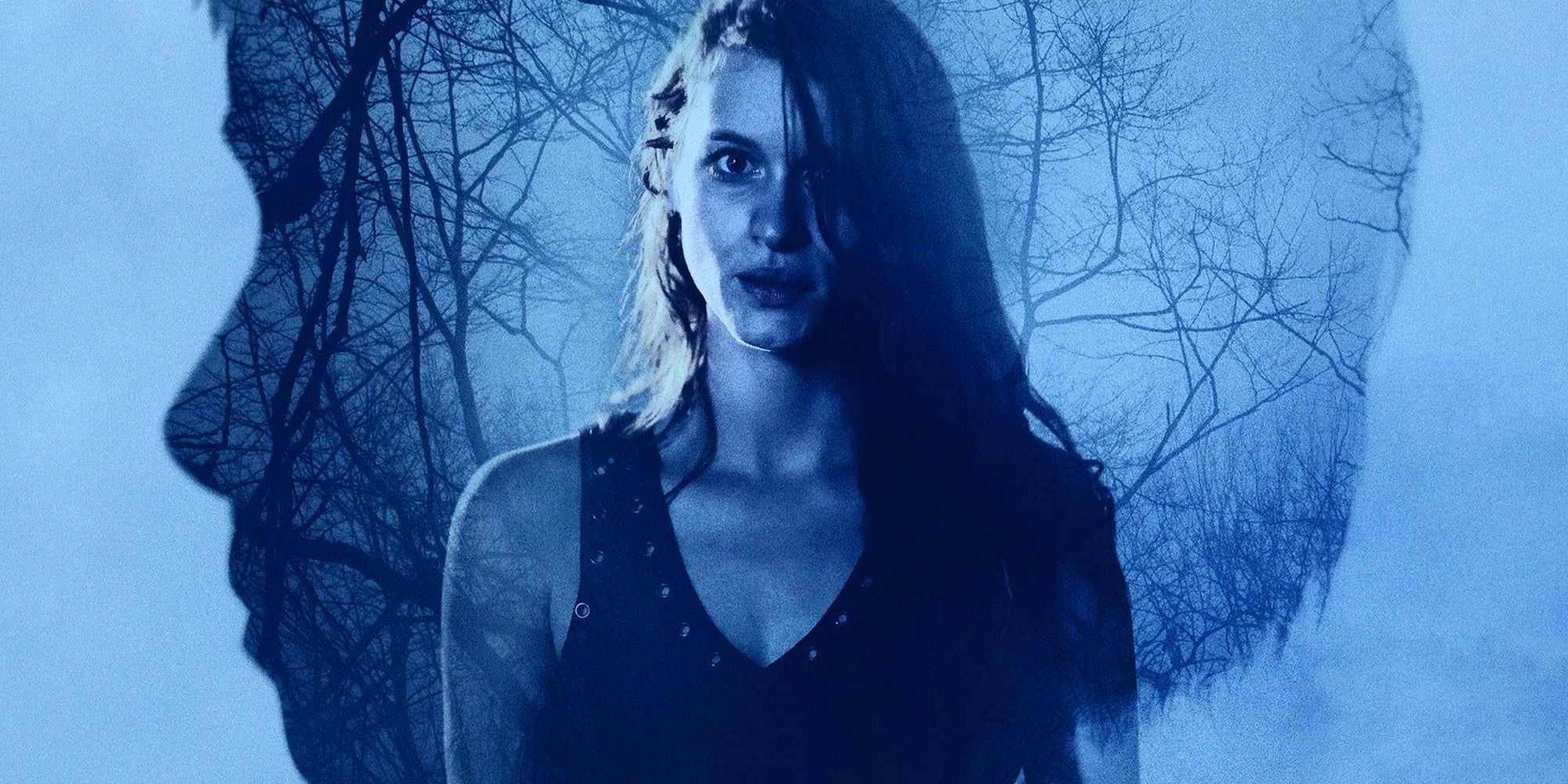 Fern, played by actor Leven Rambin, looks ahead worriedly, against a backdrop of bare trees in the shape of a child&rsquo;s face in Lost Child.