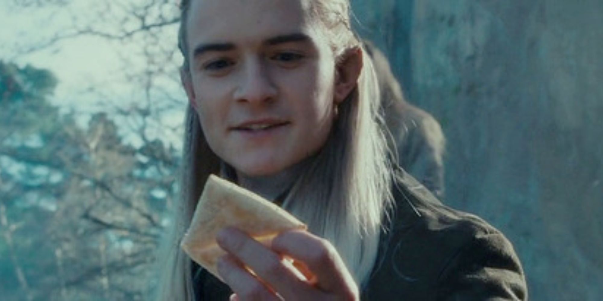 In The Lord of the Rings, Legolas (Orlando Bloom) holds lembas bread.