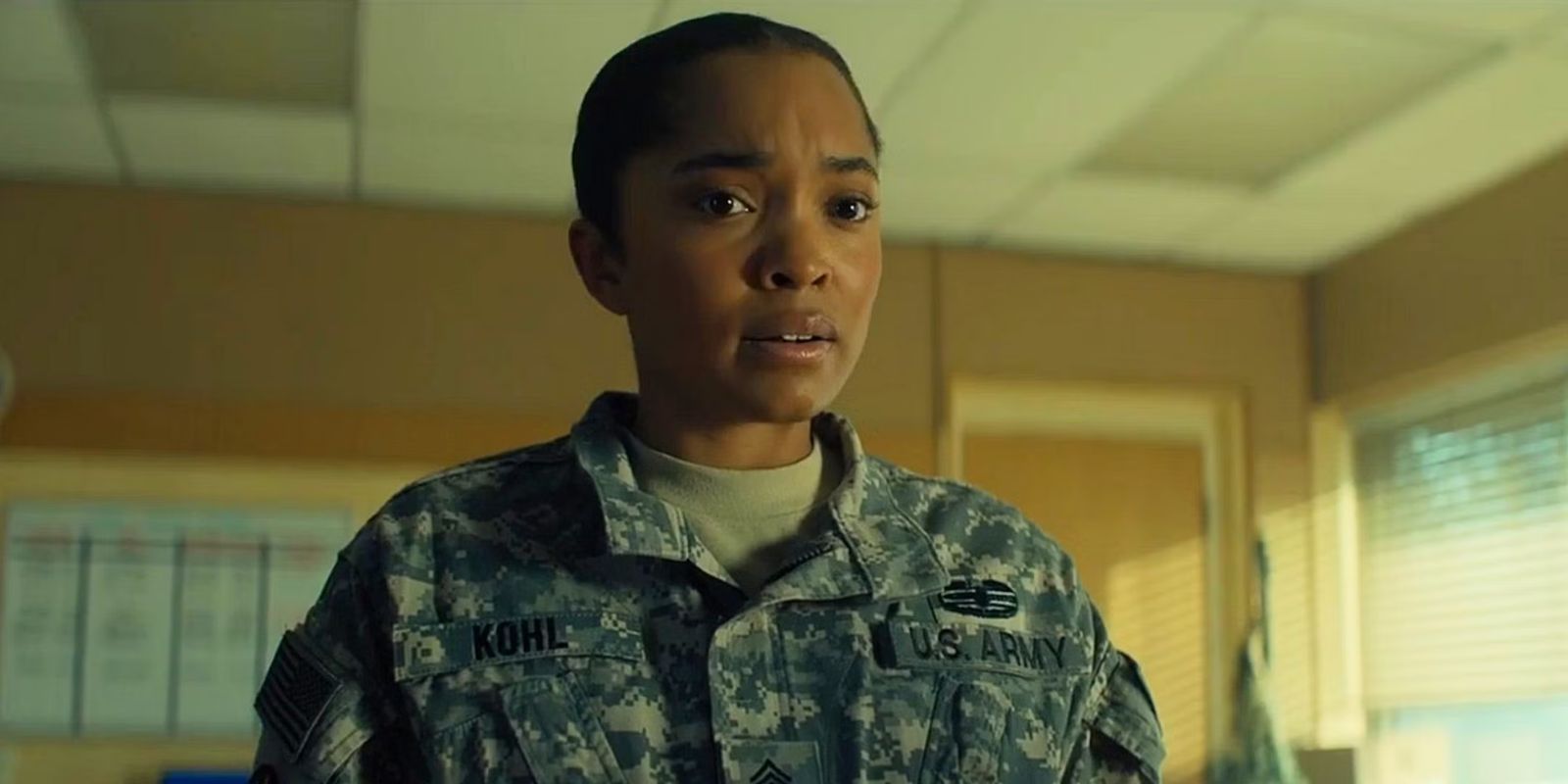 Mariah Robinson as Dominique Kohl in her uniform in Reacher