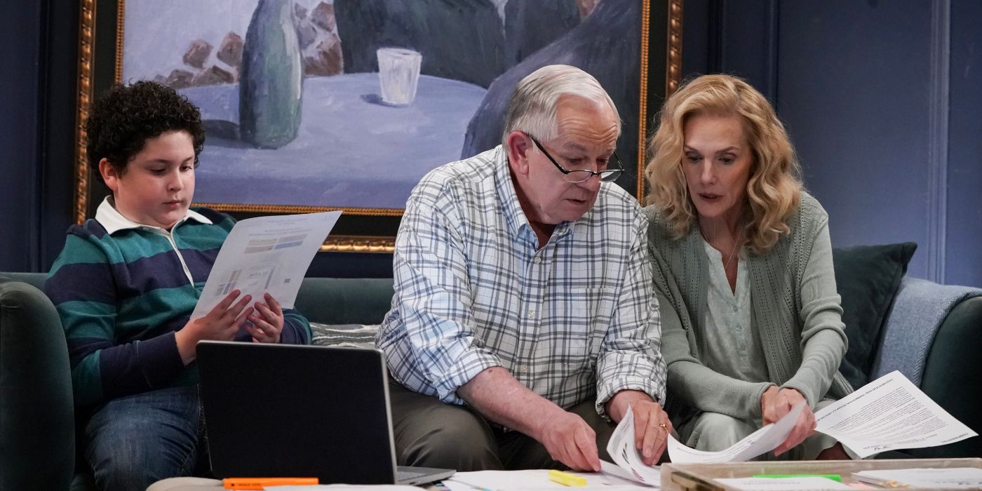 Aaron Harris, Sam Anderson, and Julie Hagerty looking through files