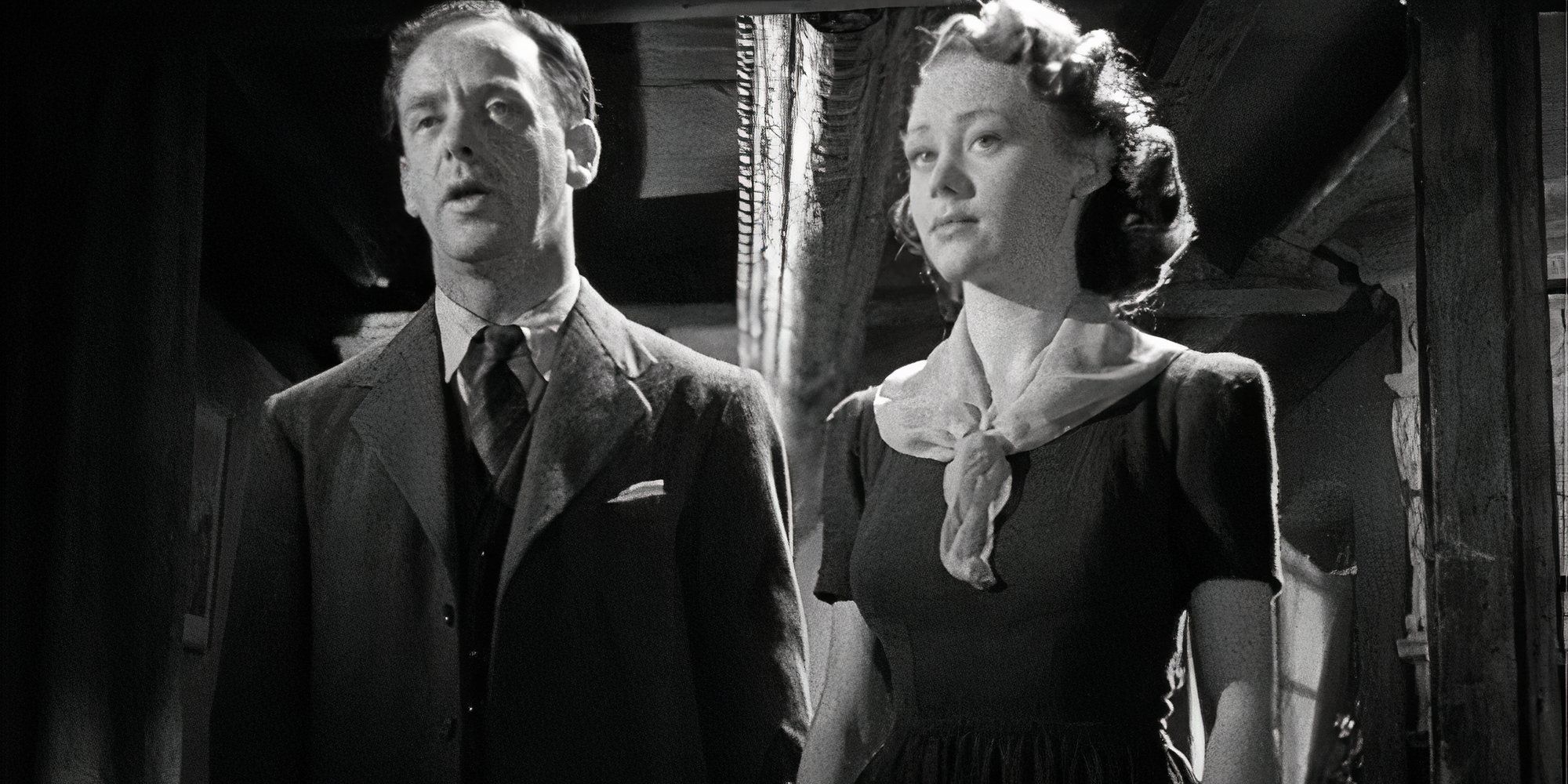 Mervyn Johns standing next to Glynis Johns in The Halfway house (1944)