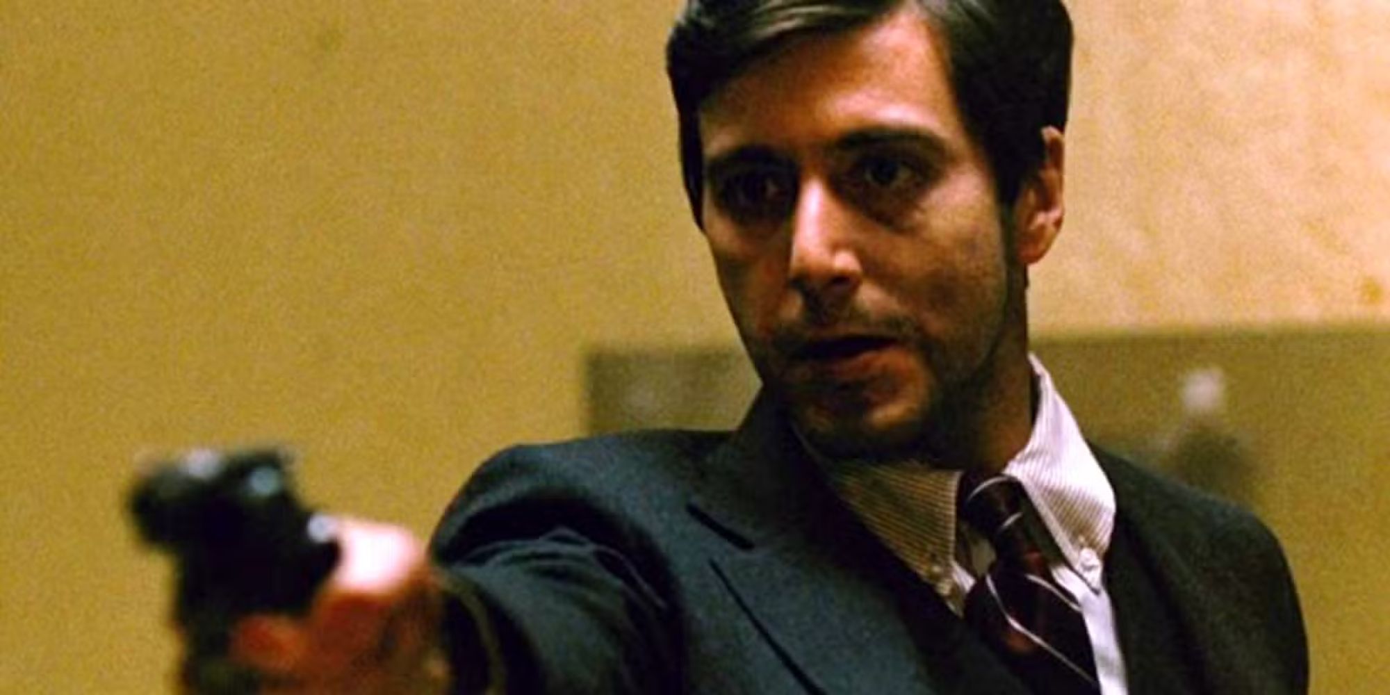 Michael aiming a gun in The Godfather.