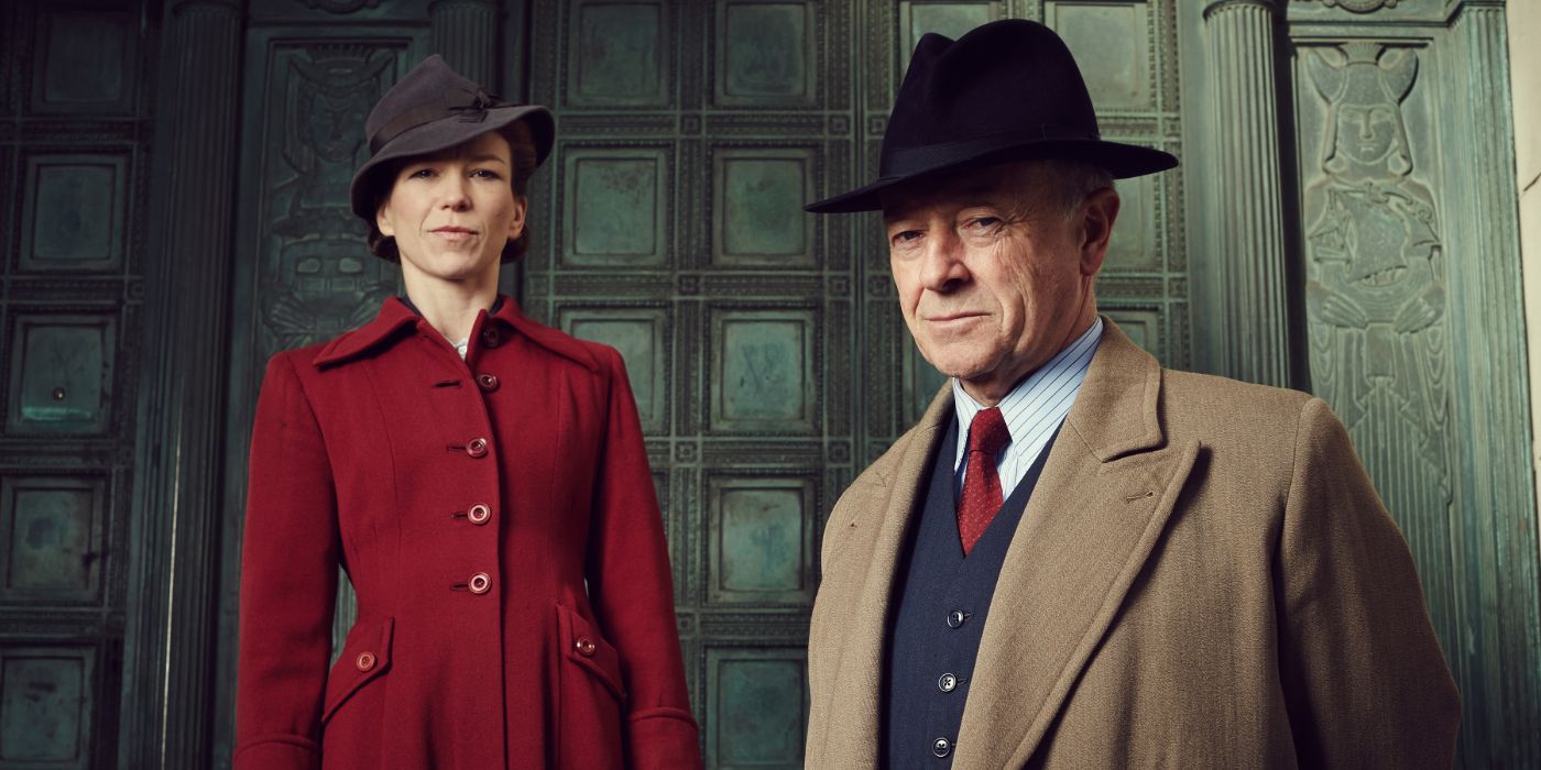Michael Kitchen as Foyle and Honeysuckle Weeks as Samantha Stewart pose in hats for Foyle&rsquo;s War.