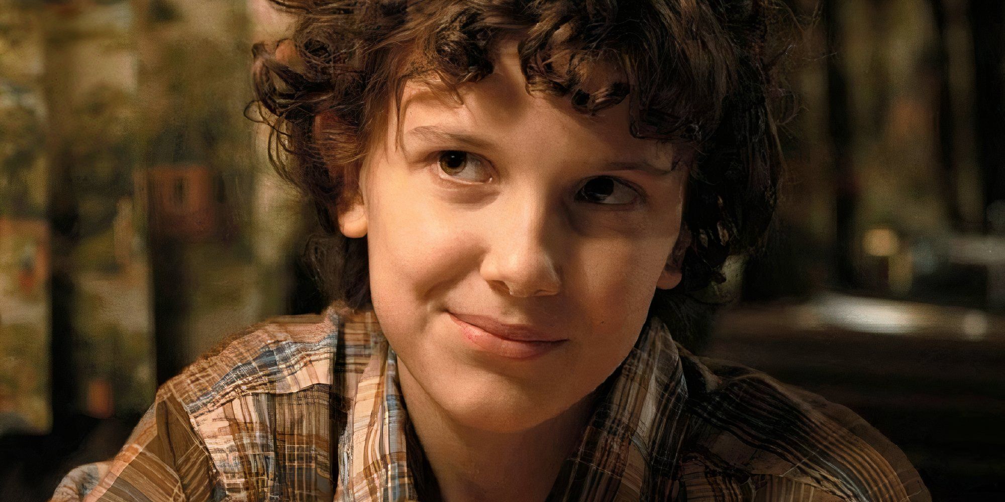 Millie Bobby Brown as Eleven in Stranger Things smiling