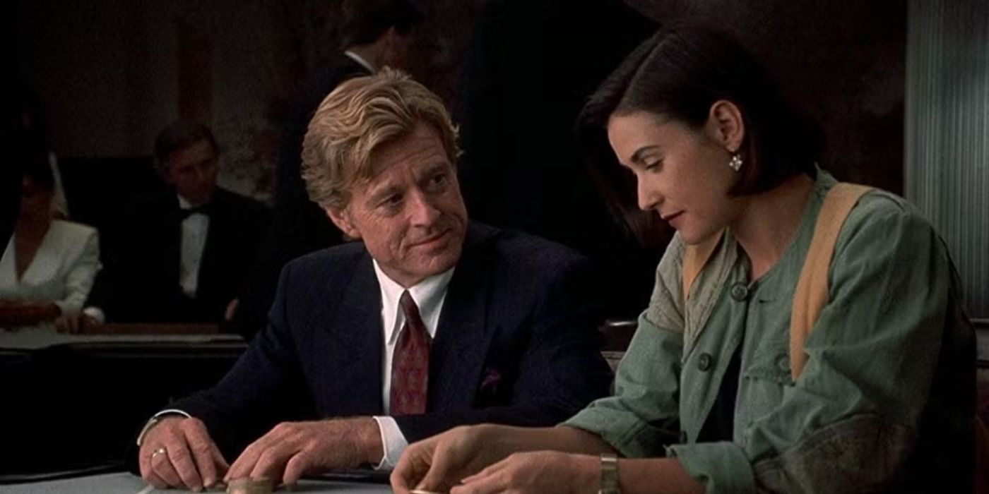 Robert Redford as John sits next to Demi Moore as Diana in a casino in Indecent Proposal. 