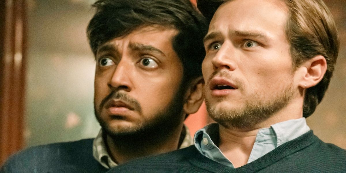 Rohan and Josh, played by actors Nik Dodani and Brandon Flynn, stand together looking scared in The Parenting.