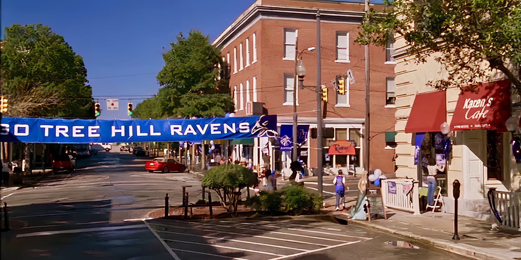 Tree hill town with a banner up.