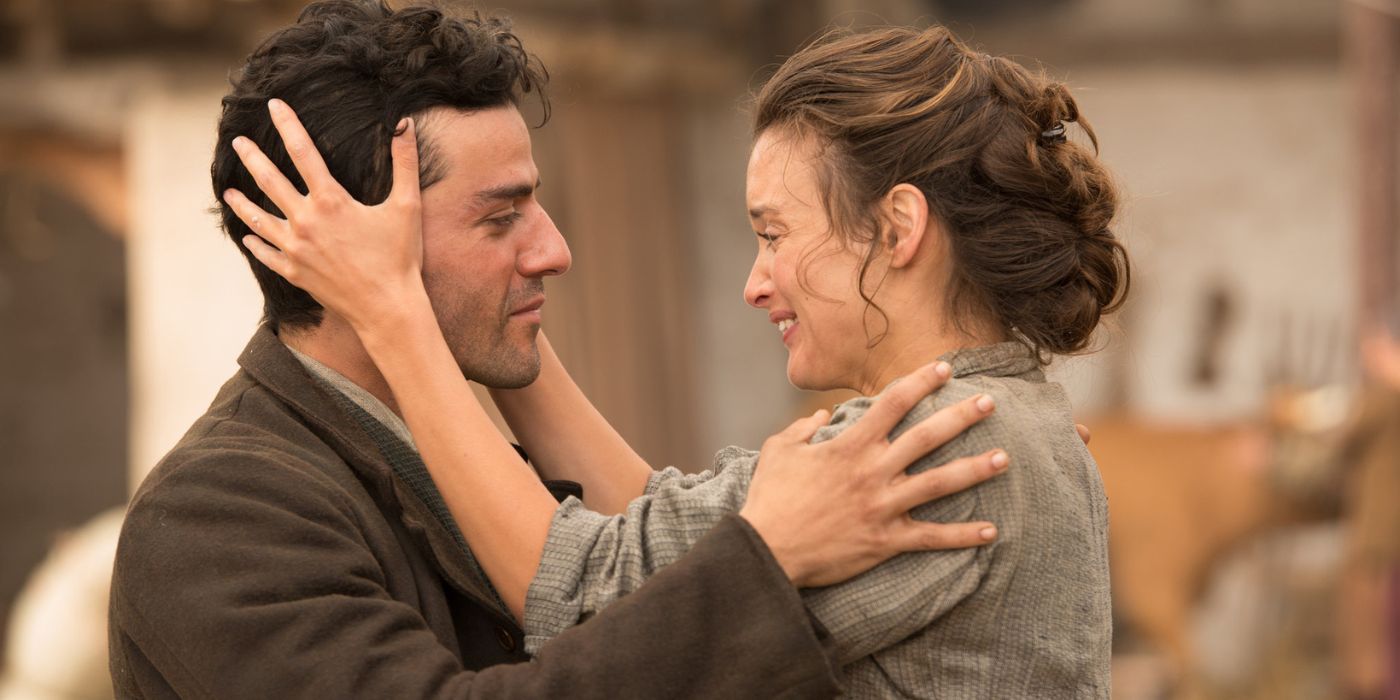 Mikael and Ana holding each other in The Promise.