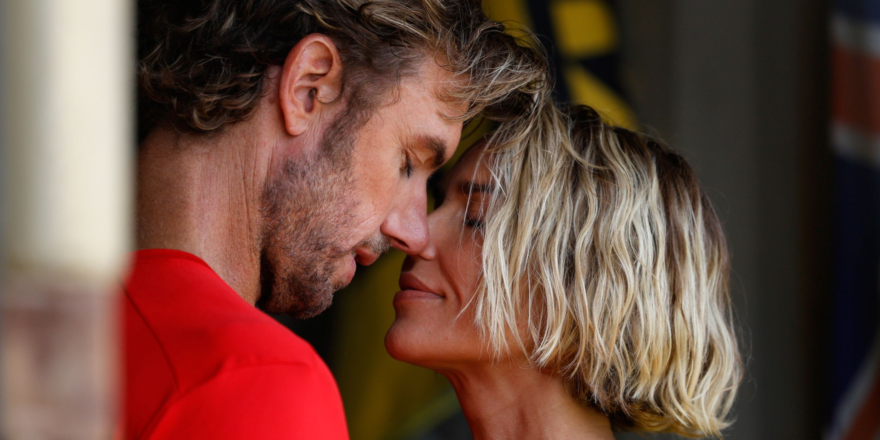 Arielle Kebbel as Em about to kiss Adam Demos as Will with their eyes closed in Rescue: HI-Surf