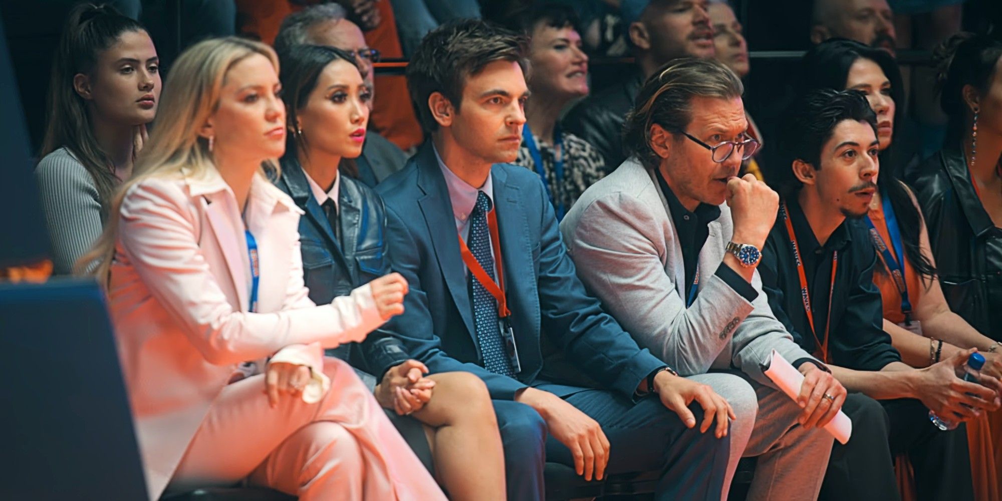 Isla Gordon, Ali Lee, Sandy Gordon, Ness Gordon, and Jackie Moreno sitting at a basketball game together in Running Point