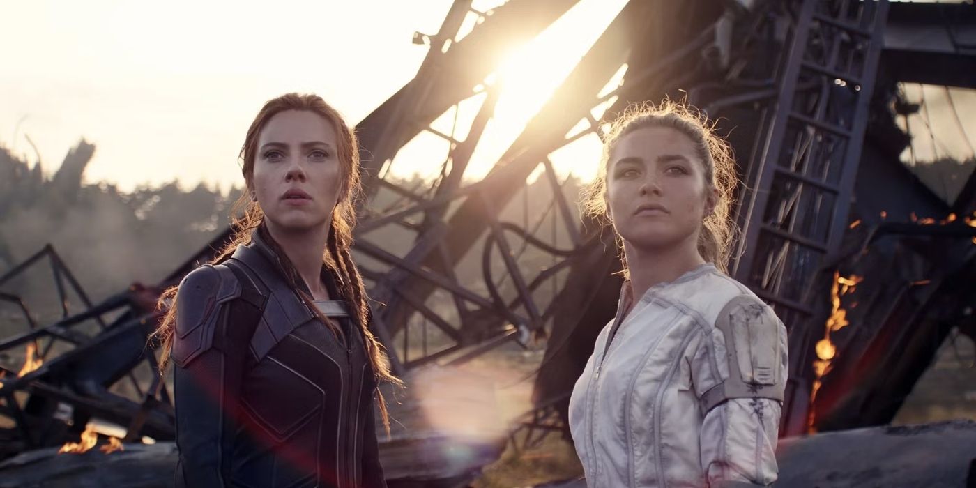 Scarlett Johansson and Florence Pugh as Natasha and Yelena looking to the distance in Black Widow.