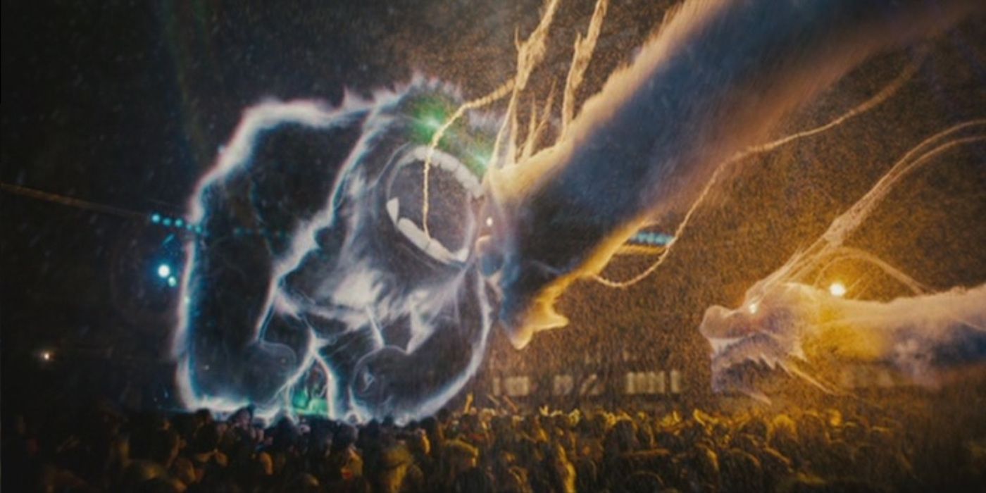 Electric monsters fight above a crowd in Scott Pilgrim vs. The World.