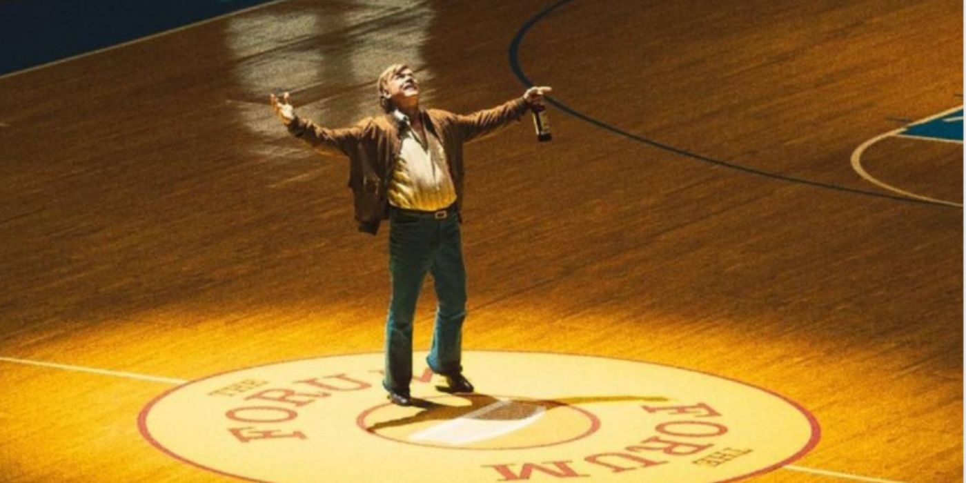 John C. Reilly as Jerry Buss wearing jeans and a brown jacket standing in the Lakers stadium in &lsquo;Winning Time&rsquo;