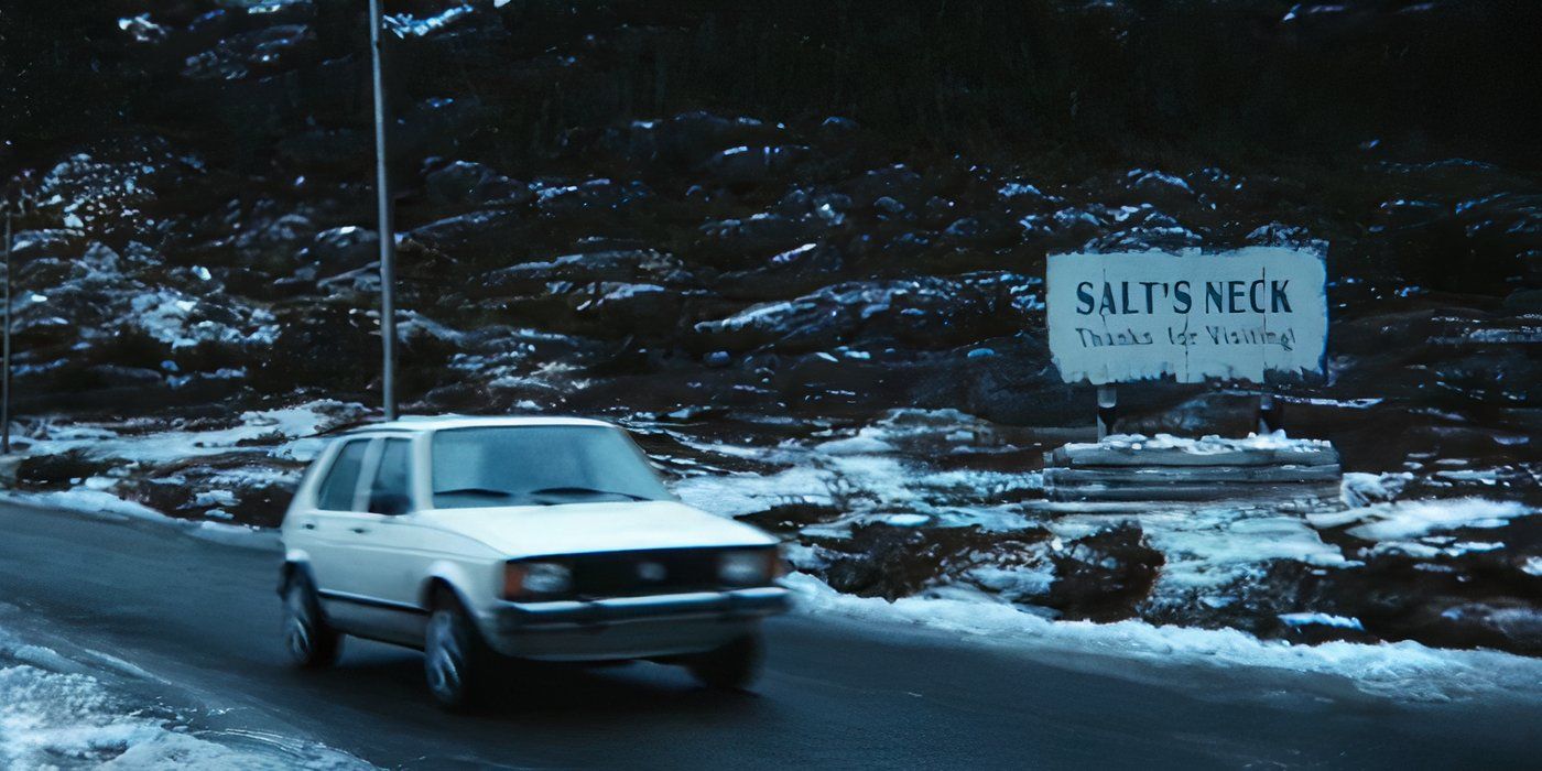 A car passes by a large welcoming billboard that reads &ldquo;Salt&rsquo;s Neck: Thanks for visiting!&rdquo; in Severance on Apple TV+.