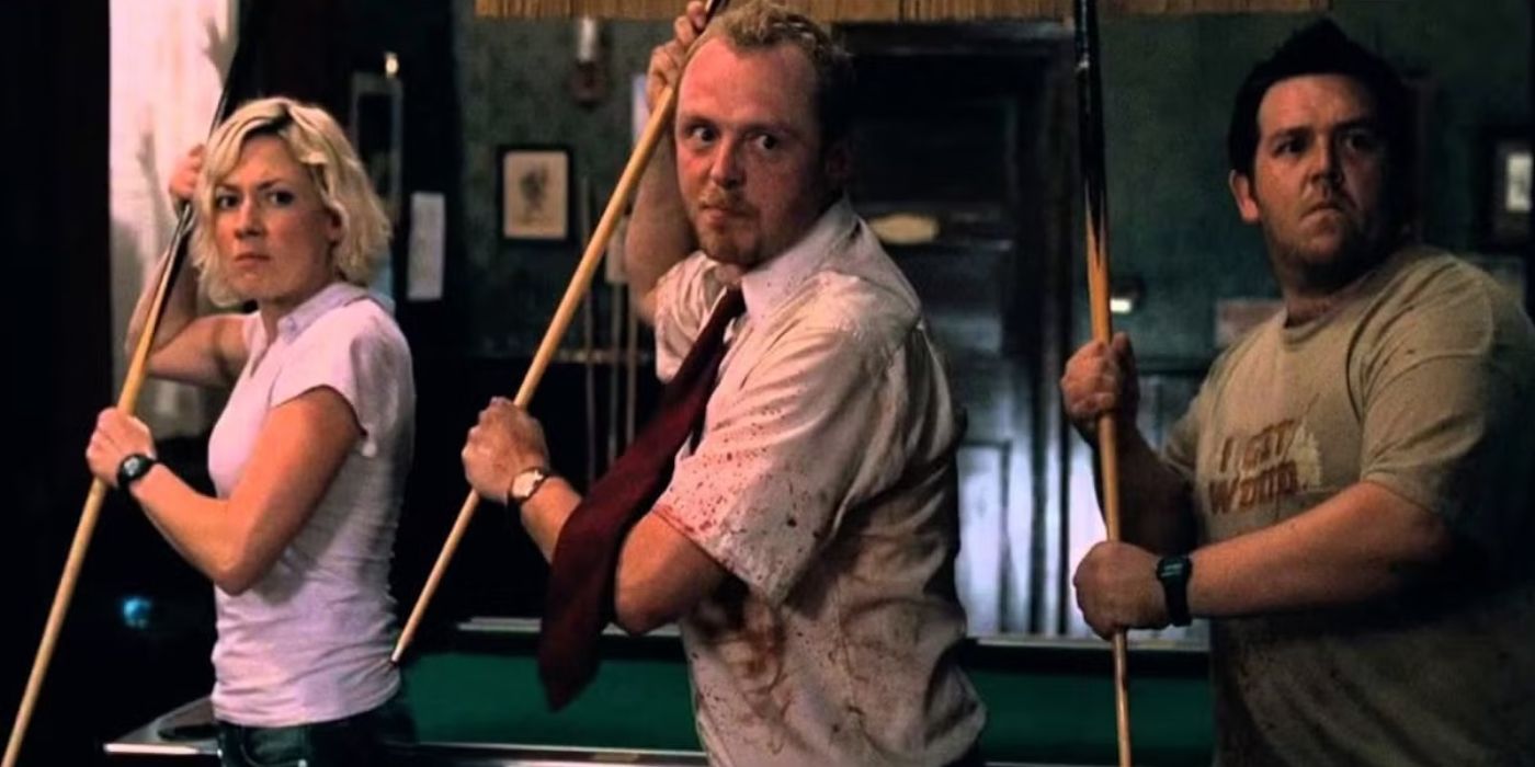 Shaun and two others hold pool cues and prepare to fight zombies inside a pub in Shaun of the Dead.