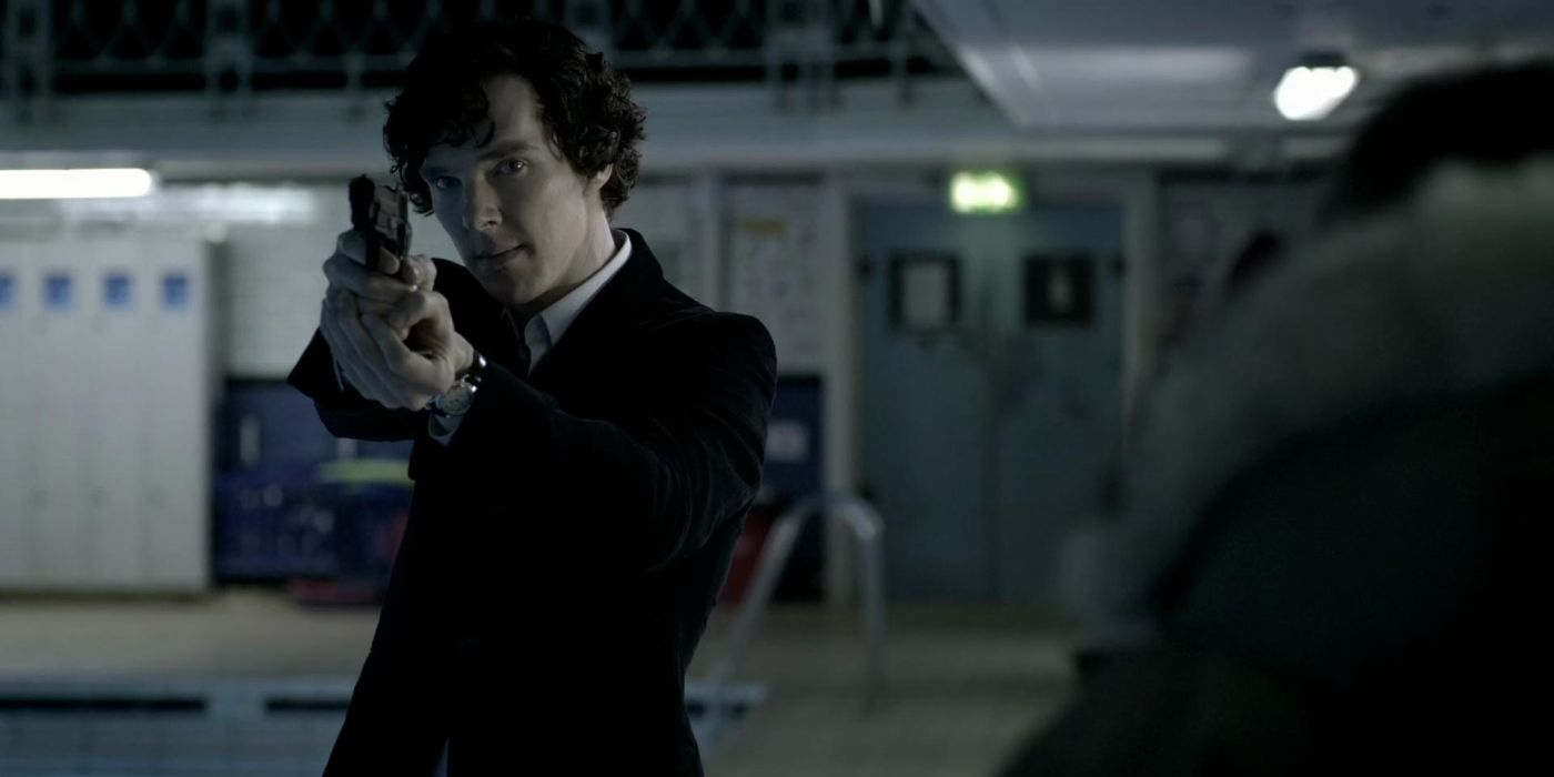 Sherlock aiming a gun in Sherlock