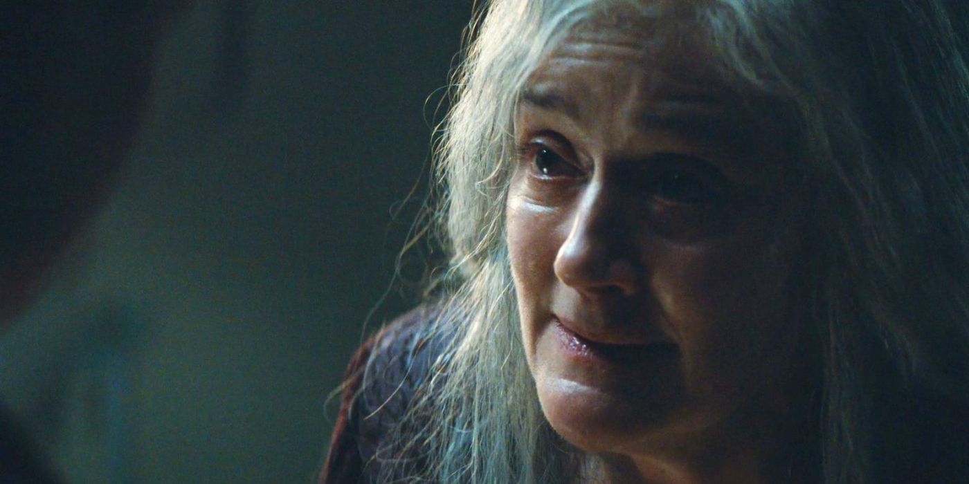 Gloria (Sophie Thompson) earnestly talking to an off-screen Juliette (Rebecca Ferguson) in Silo.